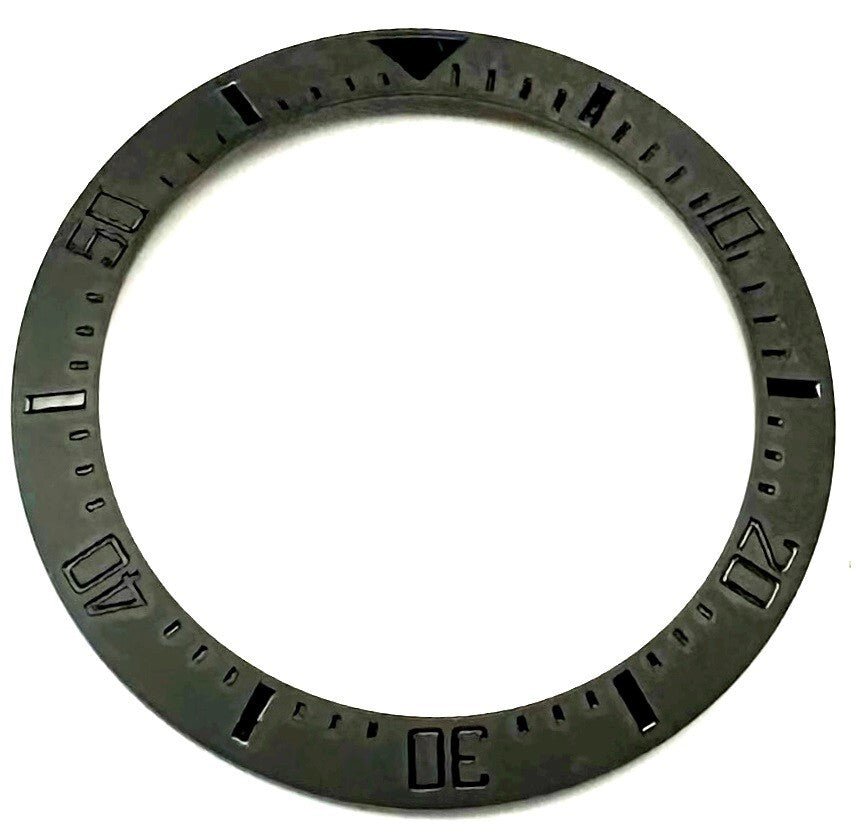 BEZEL INSERTER CERAMIC BLACK WITH BLACK FONT ON IT 39.9x31.9 mm - Universal Jewelers & Watch Tools Inc.