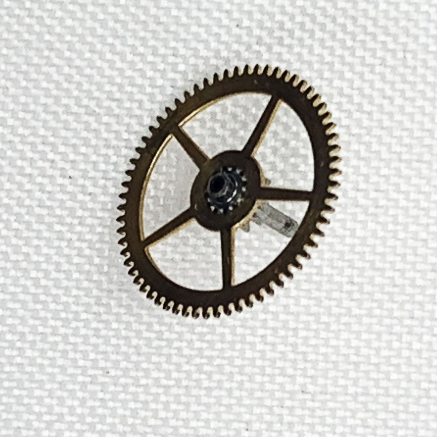 Rolex Watch Part Caliber Movement 1530 7829 Center Wheel, Genuine, Used - Universal Jewelers & Watch Tools Inc.