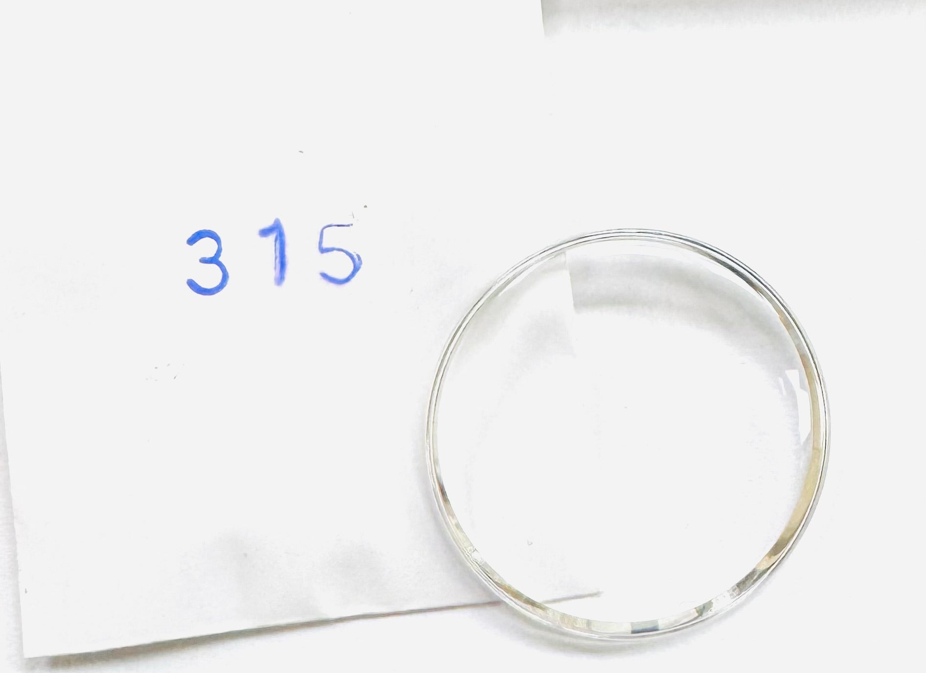 31.5mm Acrylic Watch Crystal with Silver Tension Ring for OMEGA Watches (Logo on it) - Universal Jewelers & Watch Tools Inc.