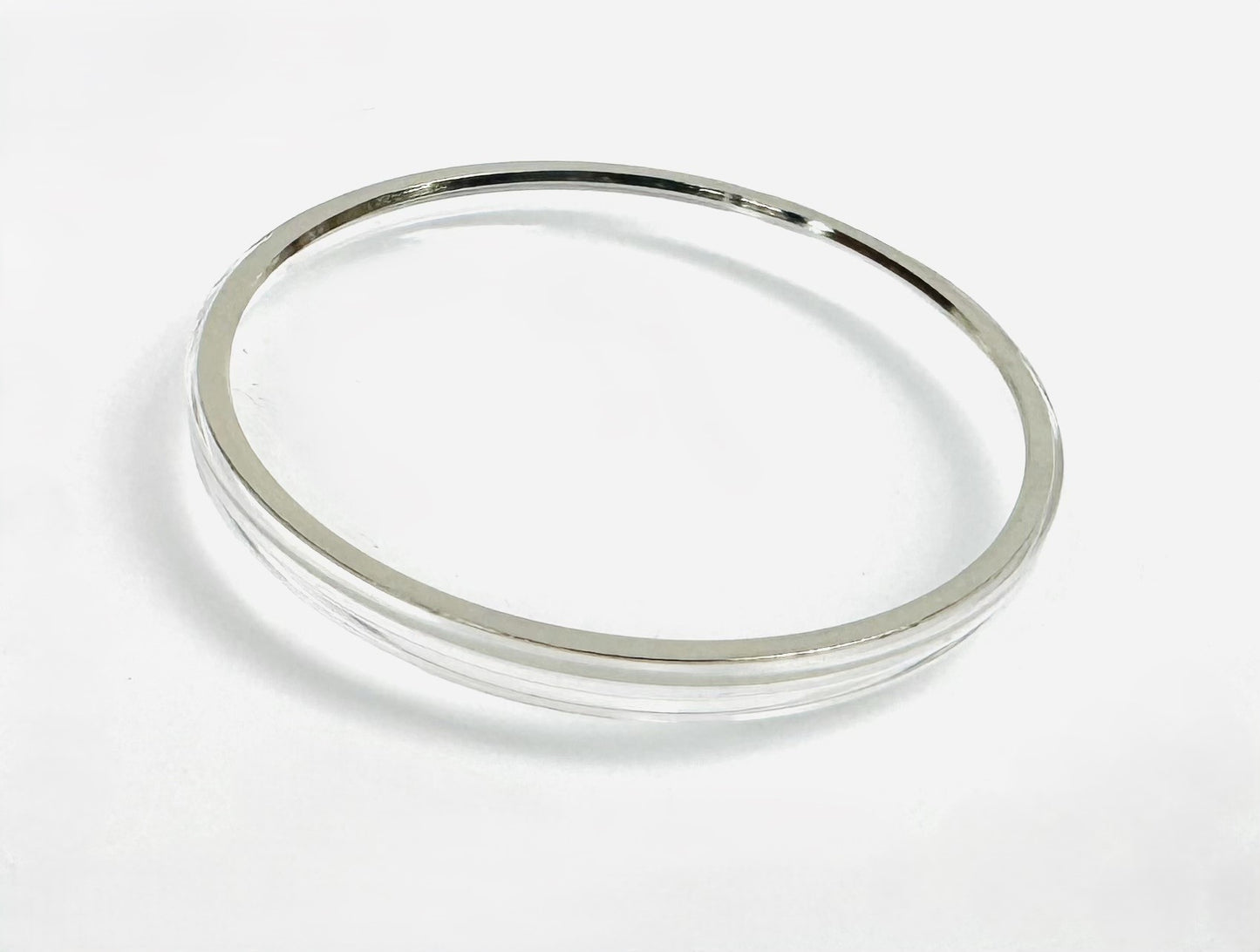 31.5mm Acrylic Watch Crystal with Silver Tension Ring for OMEGA Watches (Logo on it) - Universal Jewelers & Watch Tools Inc.