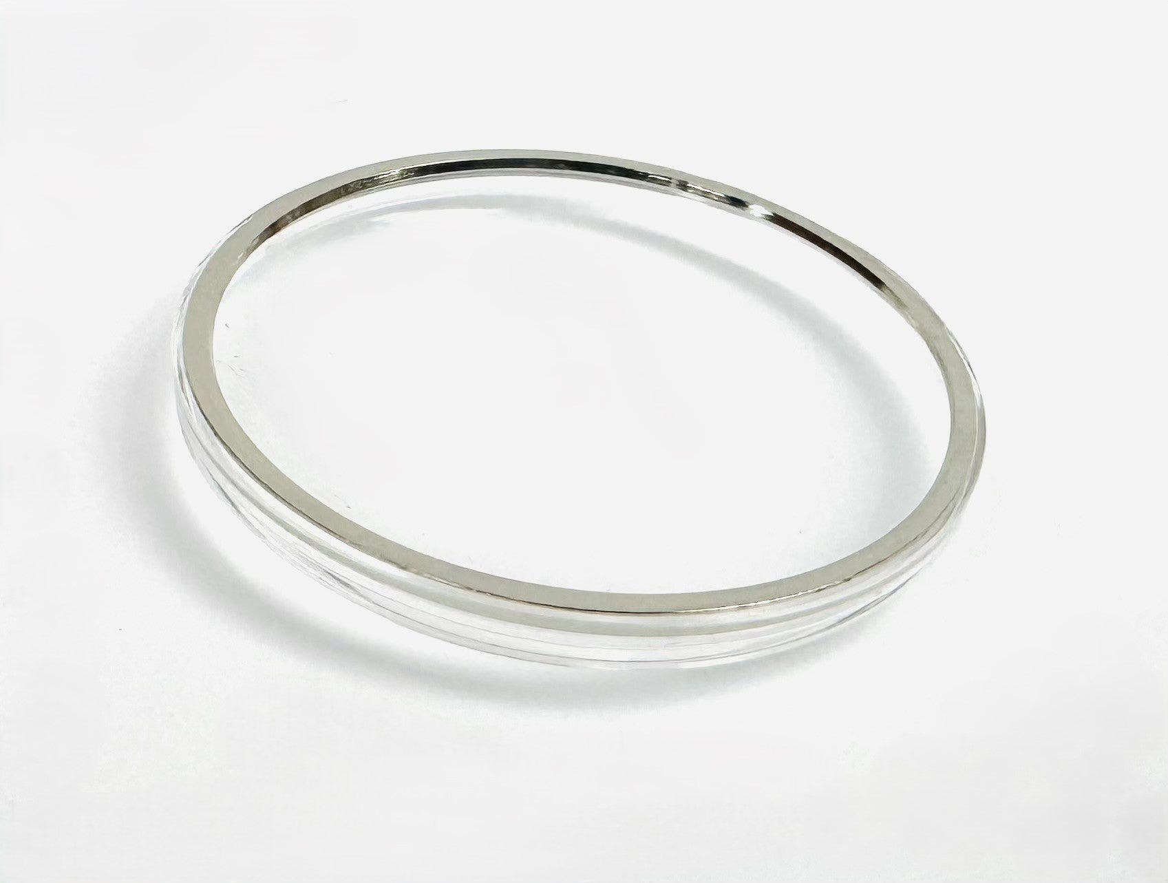 31.5mm Acrylic Watch Crystal with Silver Tension Ring for OMEGA Watches (Logo on it) - Universal Jewelers & Watch Tools Inc.